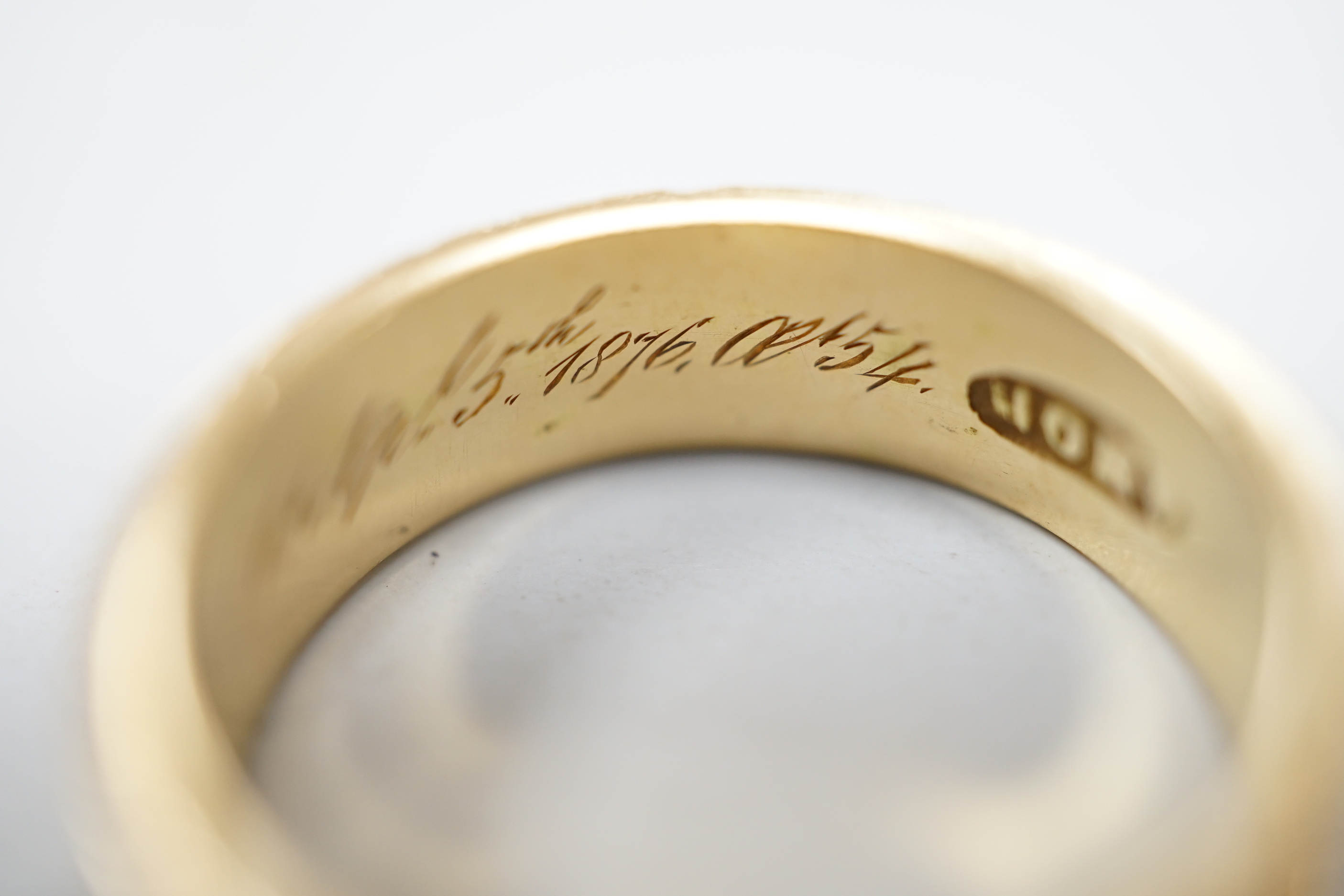 A Victorian 18ct gold and black enamel 'In Memoriam' band, inscribed ' Edwr John Lewis obt 5th April 1876, at 54', size N, gross weight 4 grams.